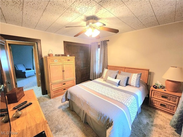 bedroom featuring carpet floors and ceiling fan