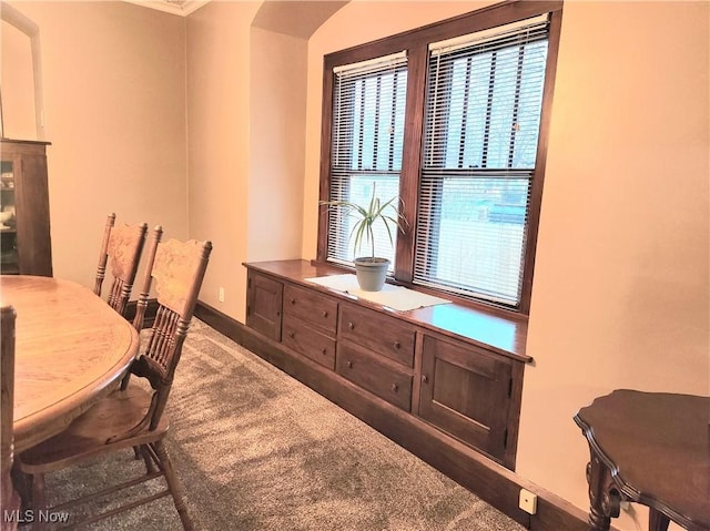 view of carpeted dining area