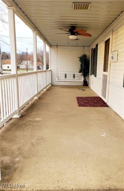 view of patio featuring ceiling fan and covered porch