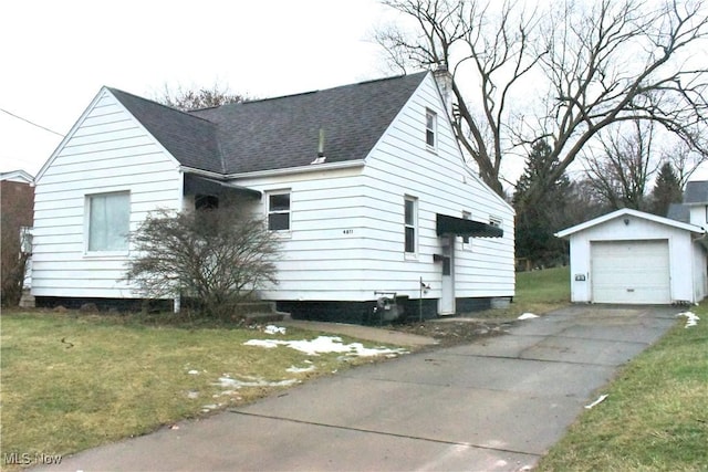 view of property exterior with a garage, an outdoor structure, and a yard