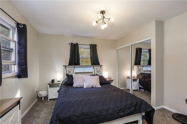 carpeted bedroom with multiple windows