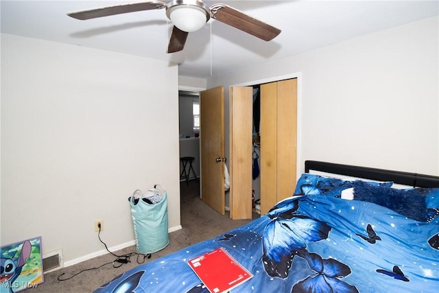 bedroom with ceiling fan, carpet floors, and a closet