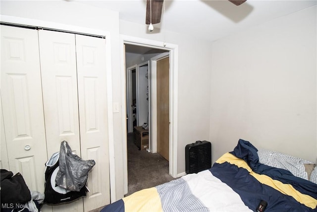 carpeted bedroom with a closet