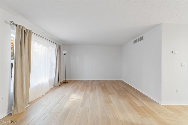 empty room featuring light hardwood / wood-style flooring