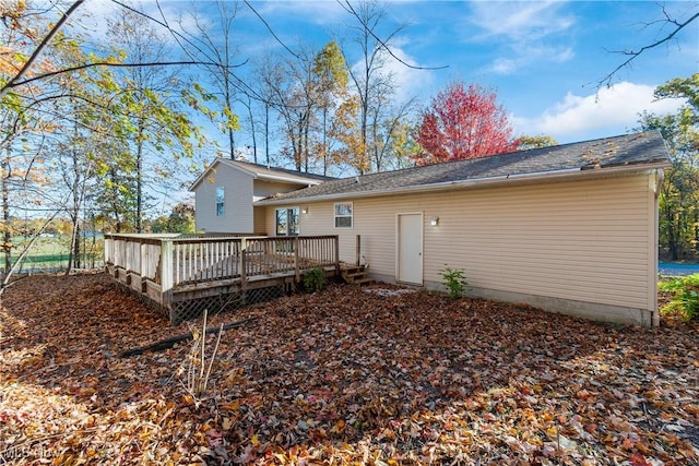 rear view of house with a deck