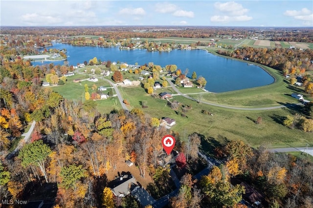 birds eye view of property with a water view