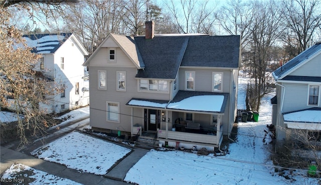 view of front property with covered porch