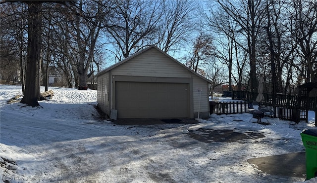 view of snow covered garage