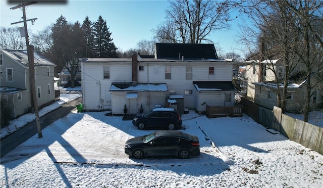 view of snow covered property