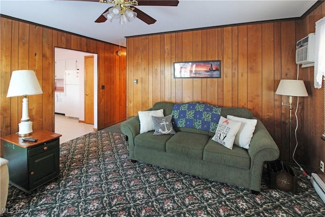 living room featuring wooden walls, an AC wall unit, and ceiling fan