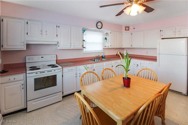 kitchen featuring ceiling fan, white appliances, sink, and white cabinets