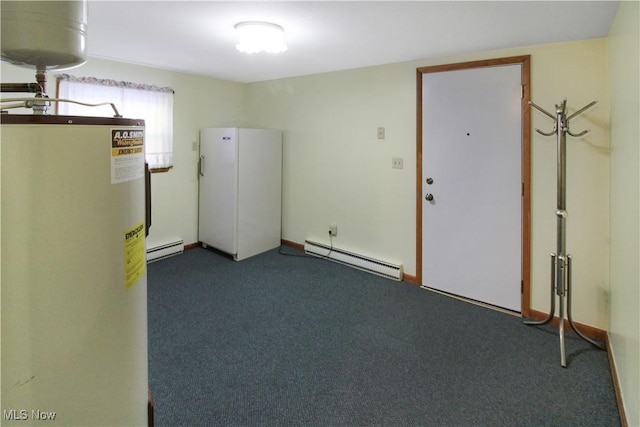 basement with a baseboard radiator, gas water heater, and dark carpet