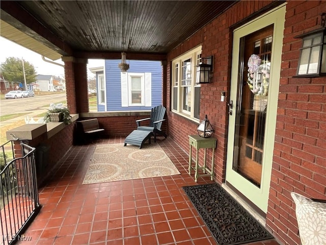 view of patio featuring a porch