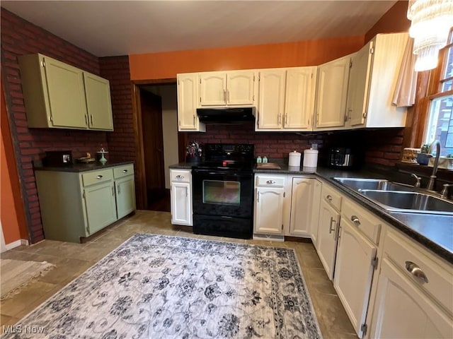 kitchen with black range with electric stovetop, decorative backsplash, sink, and white cabinets