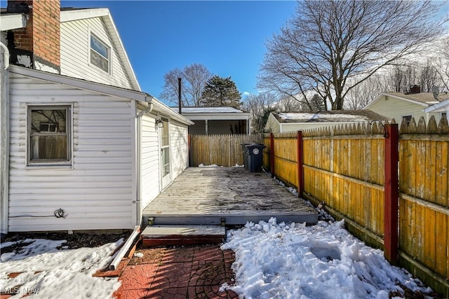 view of snow covered deck