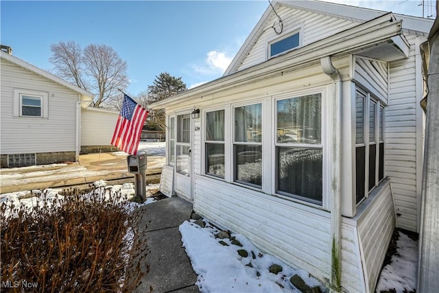 view of snow covered property