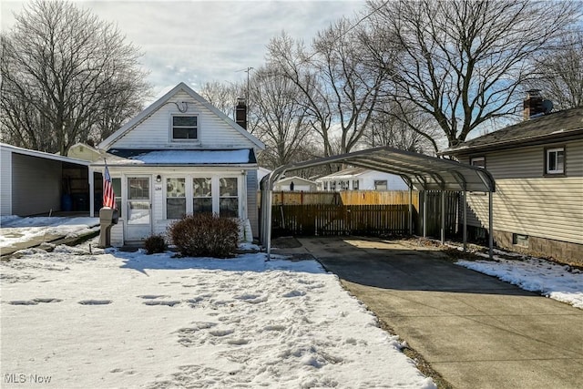 view of front of property with a carport