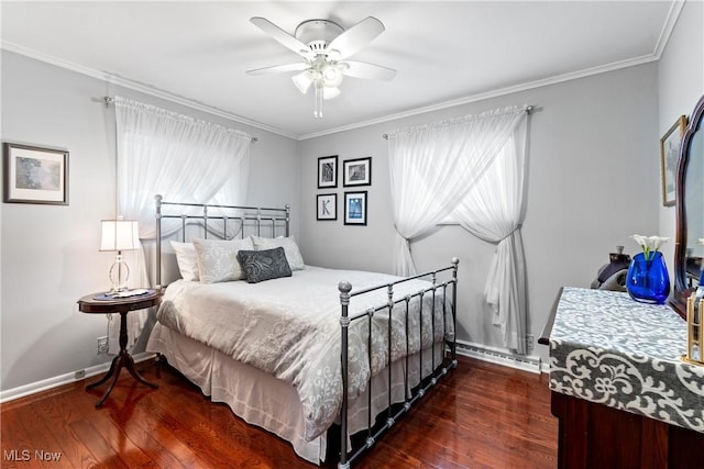 bedroom with ceiling fan, a baseboard radiator, ornamental molding, and dark hardwood / wood-style flooring