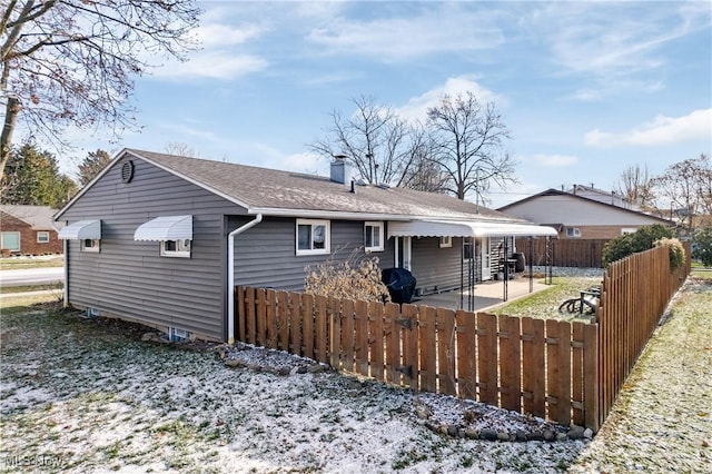 rear view of house featuring a patio area