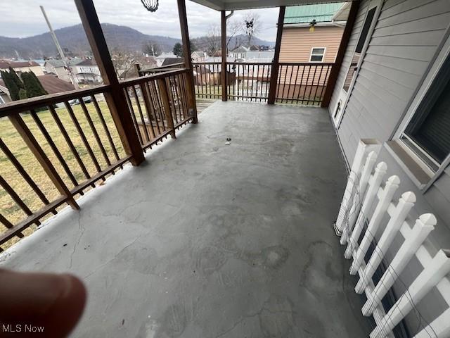 balcony featuring a mountain view