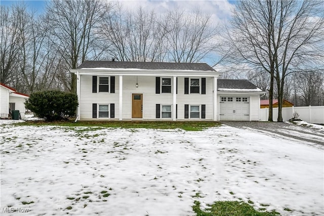 bi-level home featuring a garage