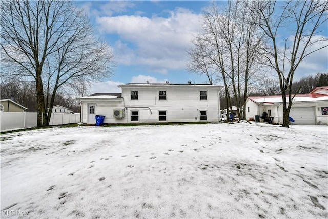 view of snow covered house