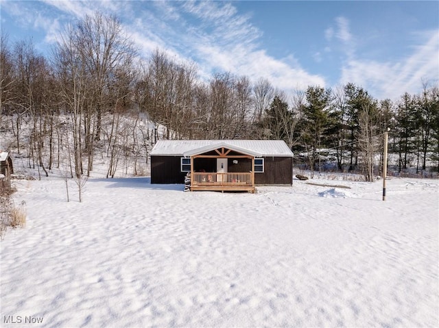 view of front of property featuring a wooden deck