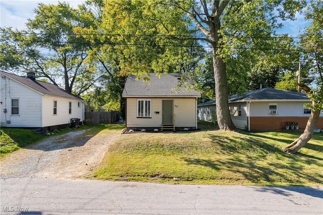 view of front of home with a front lawn