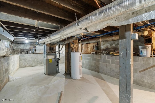 basement with heating unit and water heater