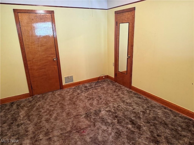 spare room with carpet