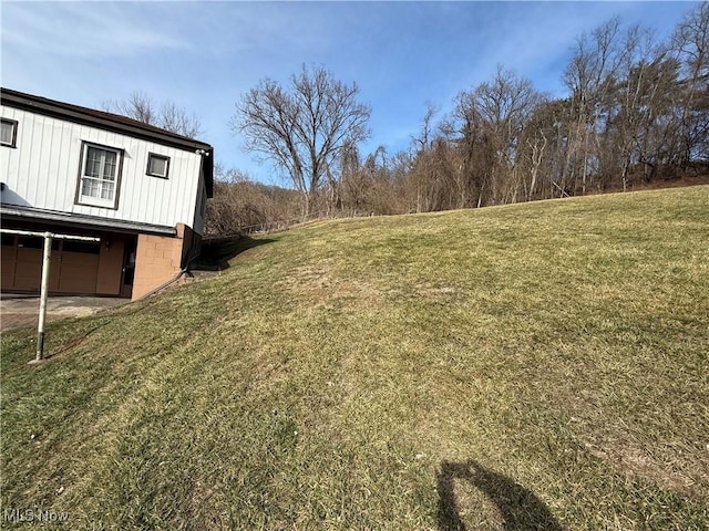 view of yard featuring a garage