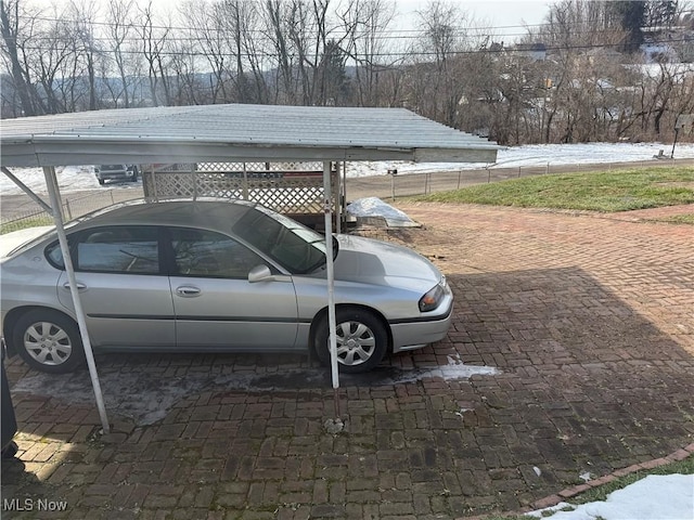 view of parking with a carport