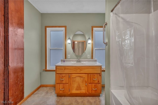 bathroom with vanity and shower / bath combination with curtain