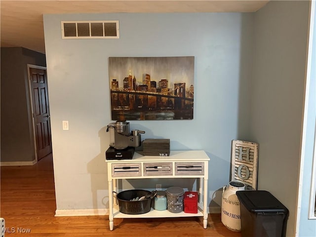 interior space with hardwood / wood-style flooring