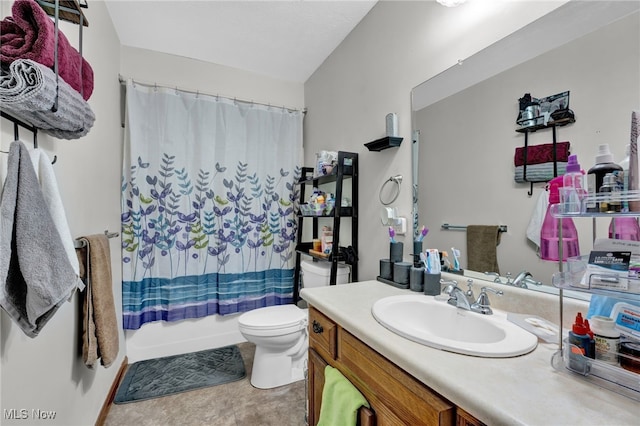 full bathroom featuring shower / bath combination with curtain, vanity, and toilet