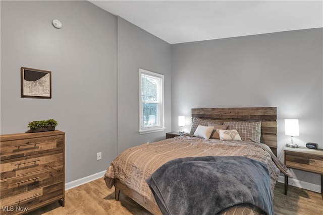 bedroom featuring light wood-type flooring