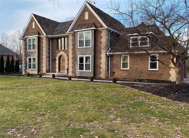 view of front of home with a front yard