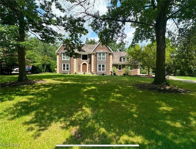 view of front of home with a front lawn