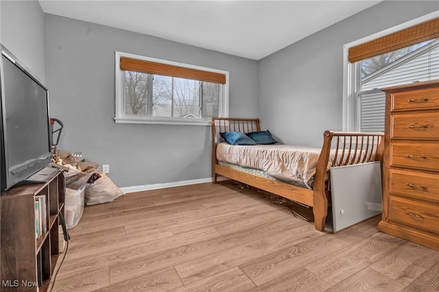 bedroom featuring light hardwood / wood-style floors