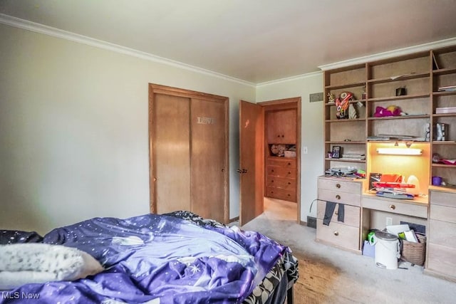 carpeted bedroom with ornamental molding