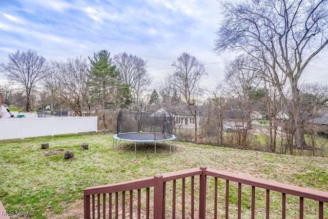 view of yard with a trampoline