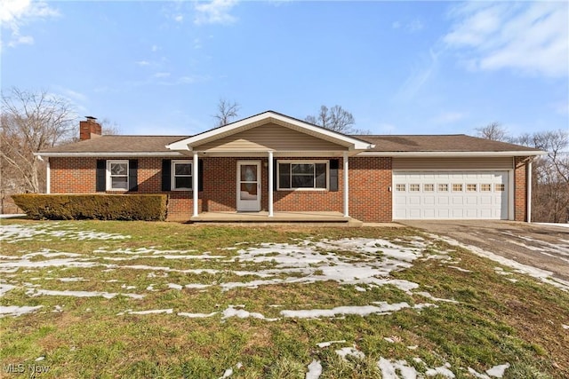 ranch-style house with a garage, a front lawn, and a porch