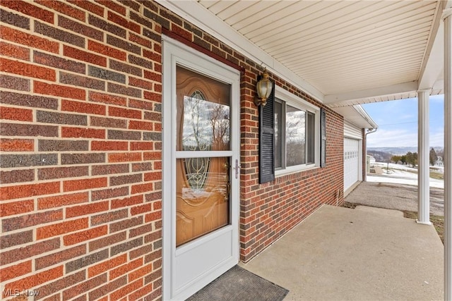 property entrance featuring a garage