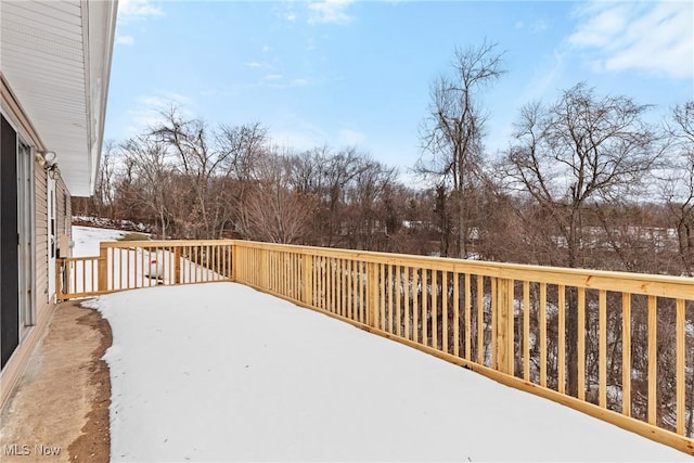 view of snow covered deck