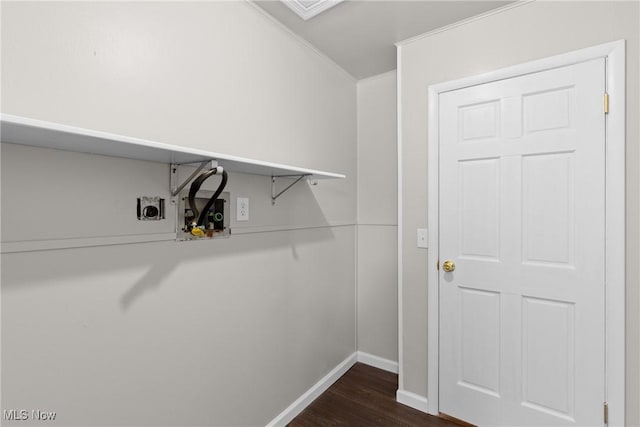 washroom with ornamental molding, hookup for an electric dryer, dark hardwood / wood-style flooring, and hookup for a washing machine