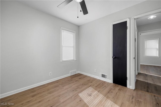 interior space featuring ceiling fan and light wood-type flooring