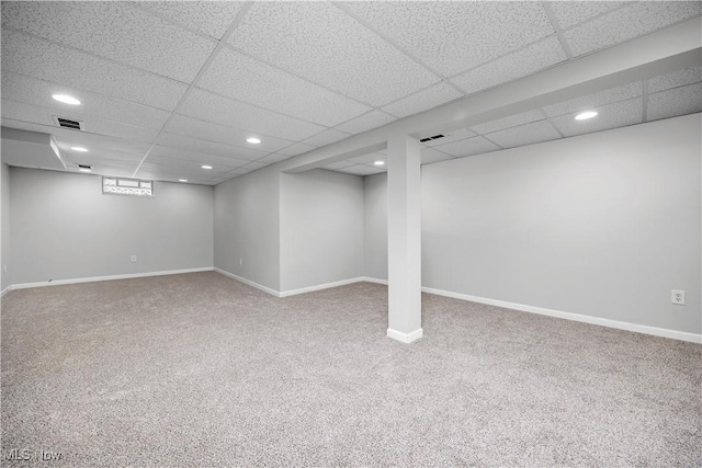 basement featuring carpet flooring