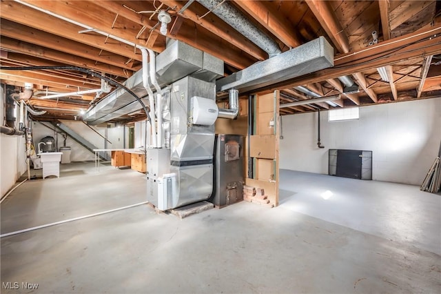 basement featuring heating unit