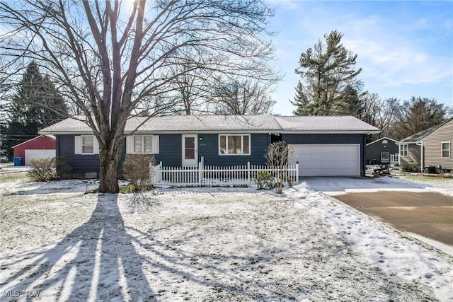 single story home with a garage