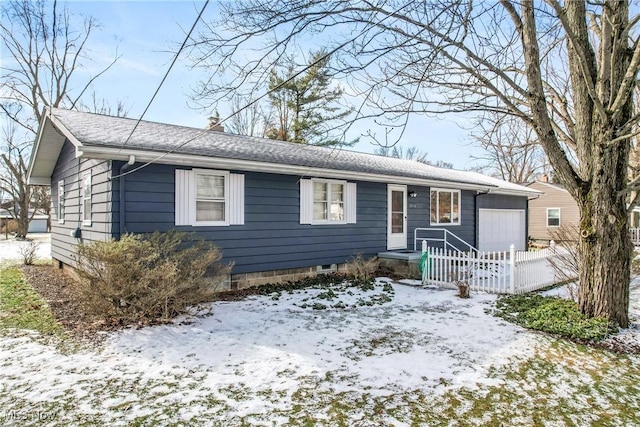 single story home featuring a garage